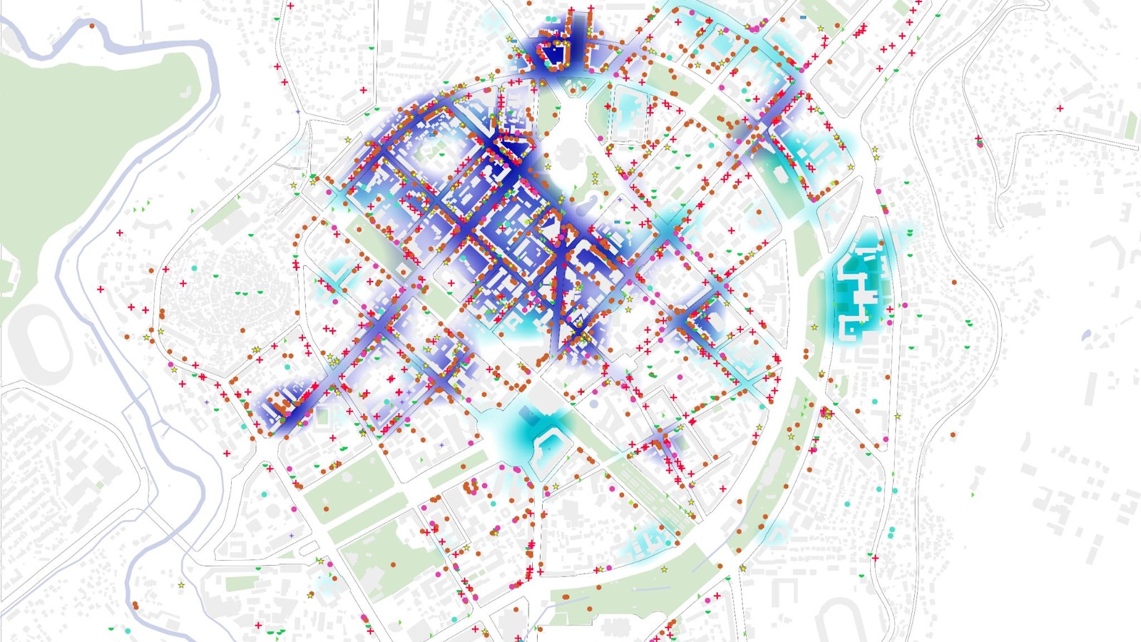 The amenity fabric of central Yerevan: every point of interest around the site, coloured by category, over the city's buildings and its garden-city ring.