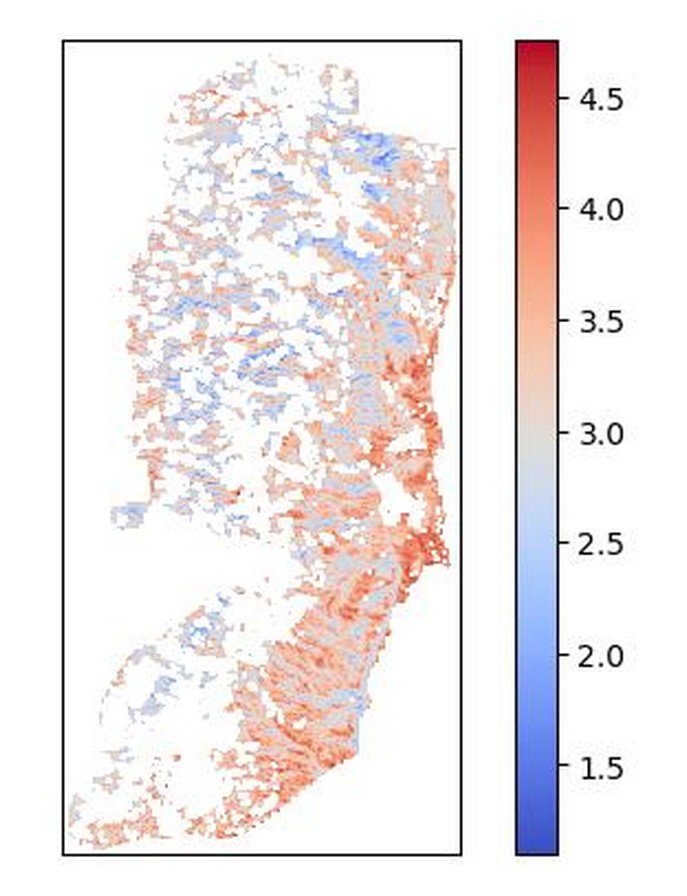 The weighted suitability surface: every cell scored from low (blue) to high (red) by combining the five layers.
